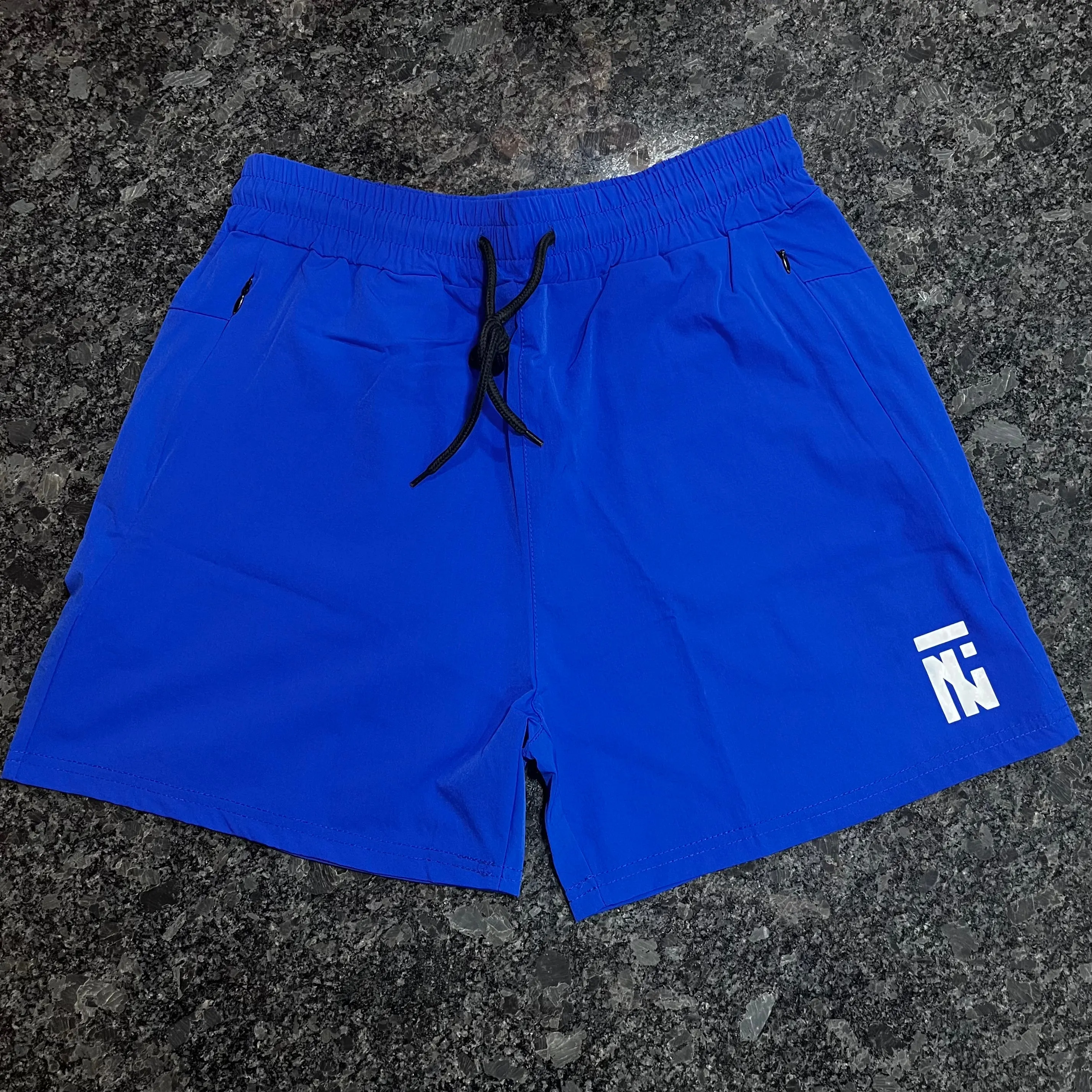 Prime Quad Shorts V2 - Emblem Logo